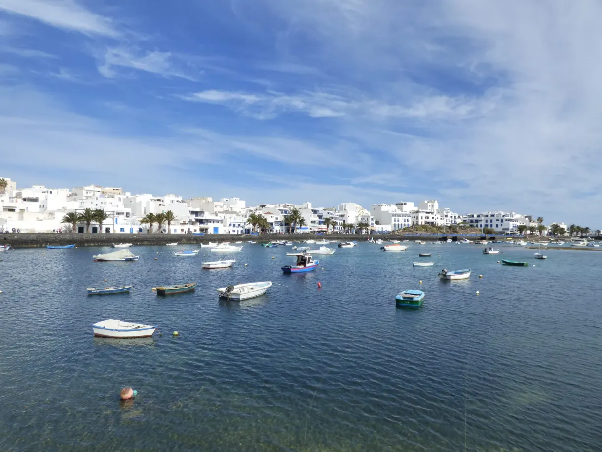 Charco de San Ginés lagoon lined with small boats
