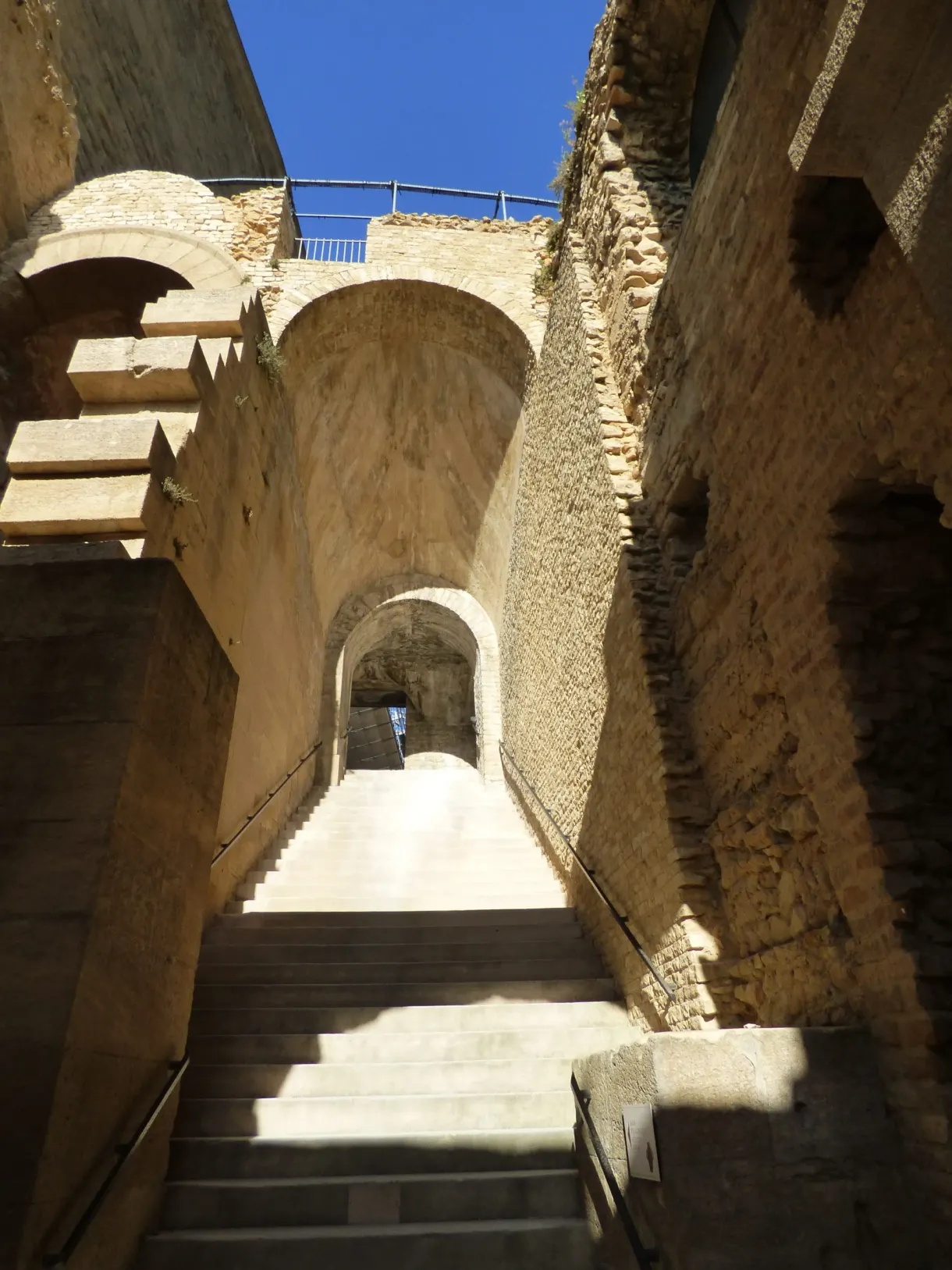 Stone staircase beneath the vaults of the ancient monument
