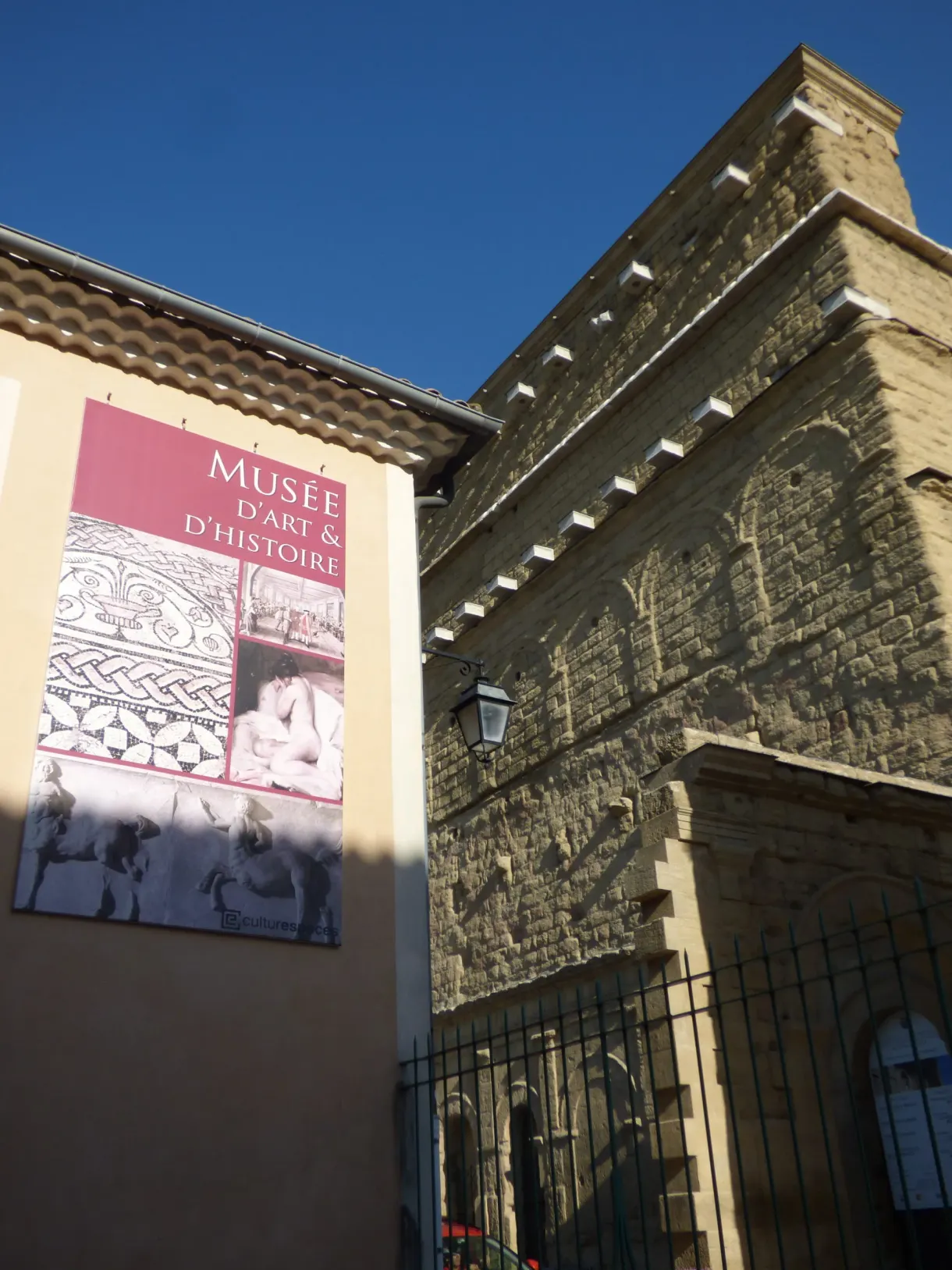 Poster of the art and history museum on a stone facade