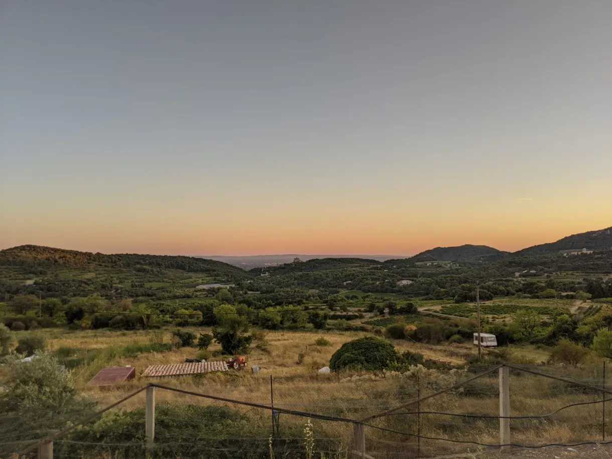 Countryside and hills at dusk from the grounds of the rental