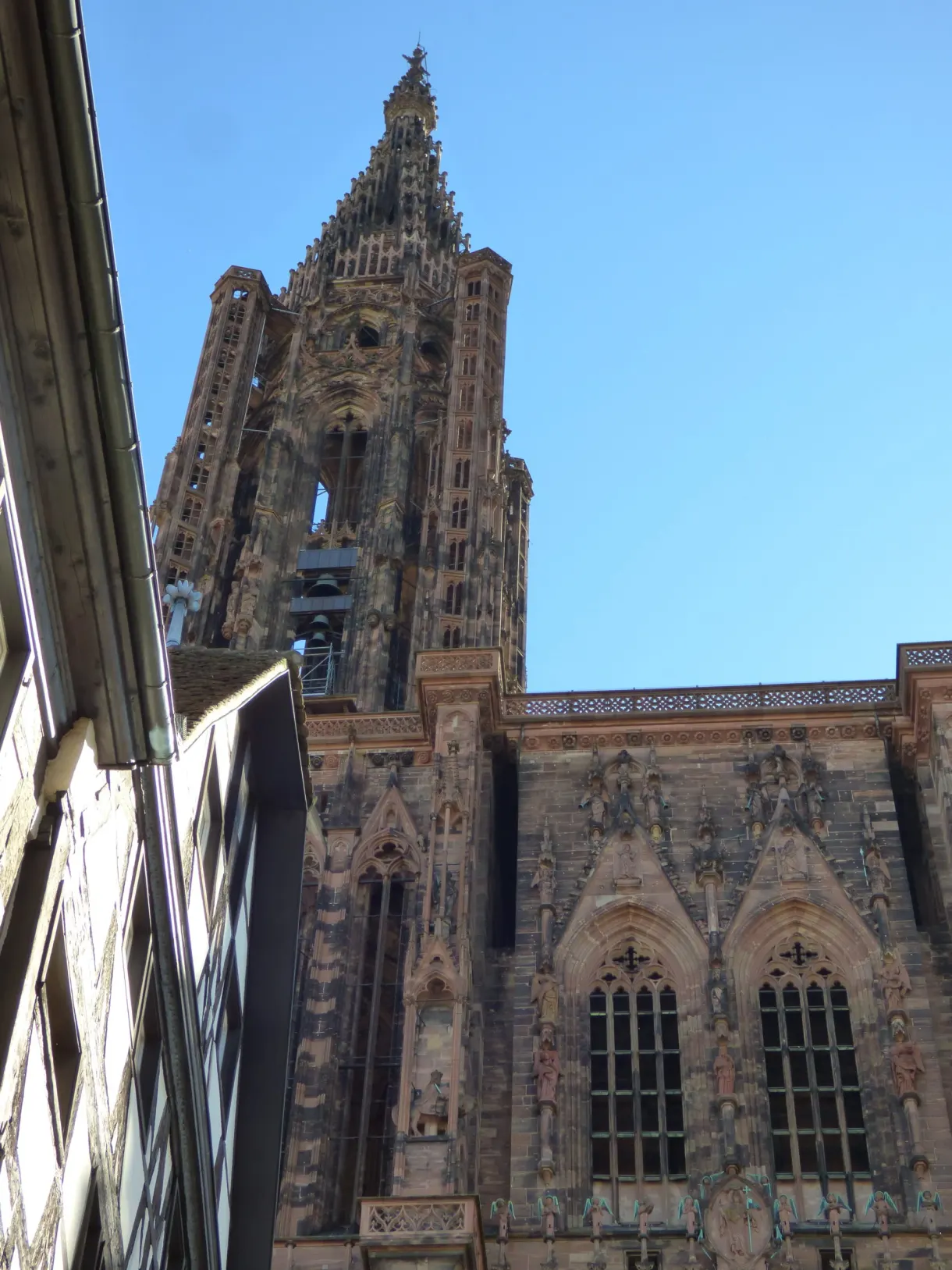 Pink sandstone tower of the cathedral, shot from below
