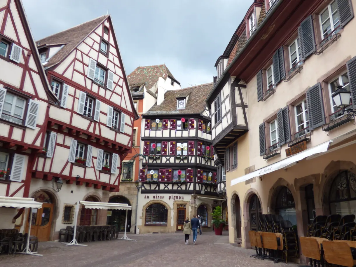 Terraces set up under the arcades of an old square