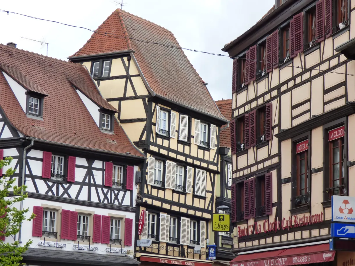 Half-timbered corner houses meeting on the square