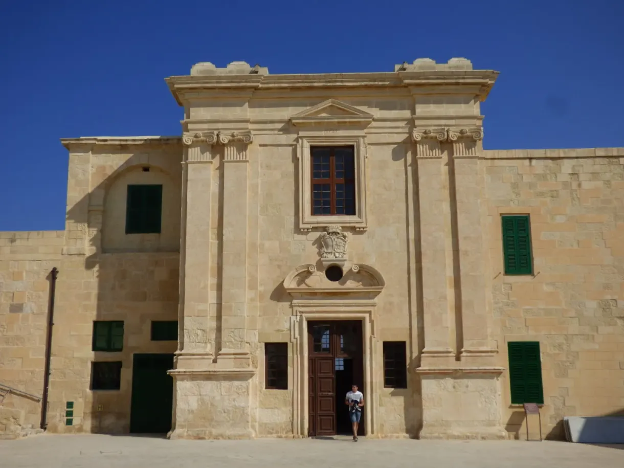 Baroque facade in golden stone of the museum building