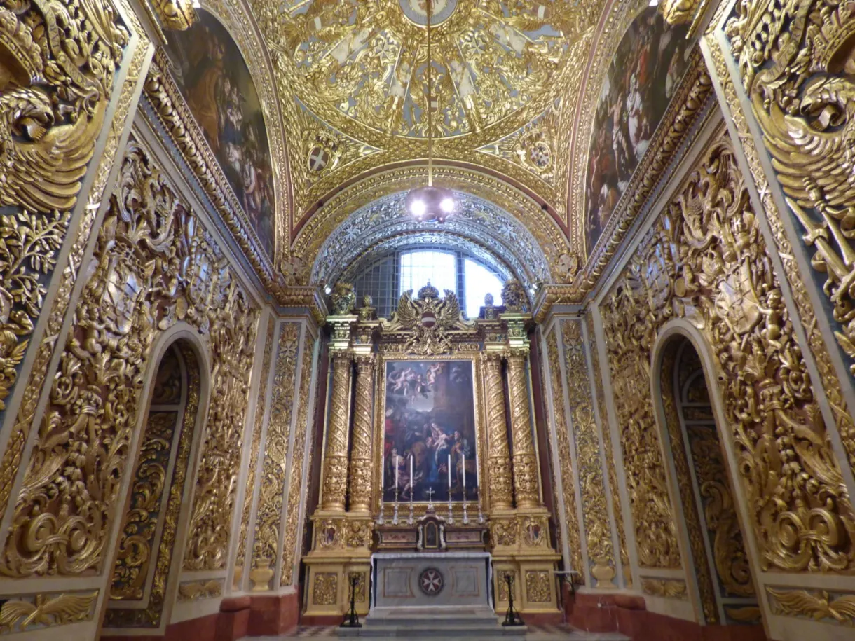Side chapel covered in gilded carvings and marble