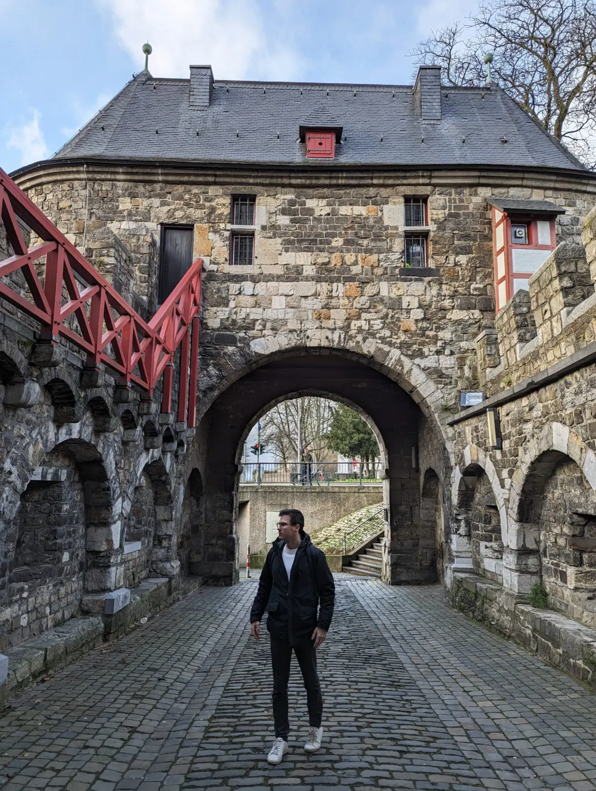 Vaulted passage through an old stone medieval gate