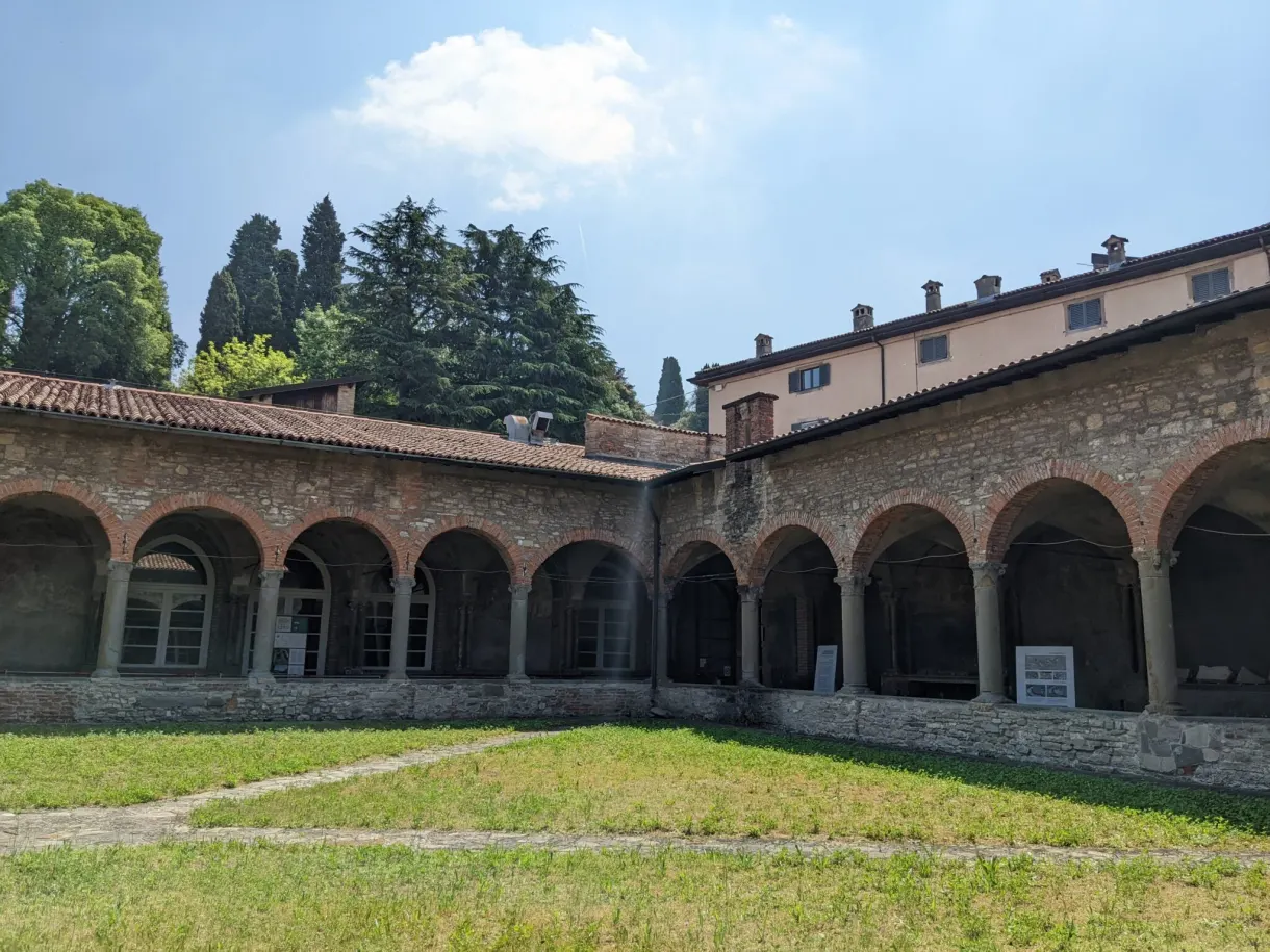 Arcaded cloister surrounding a square lawn