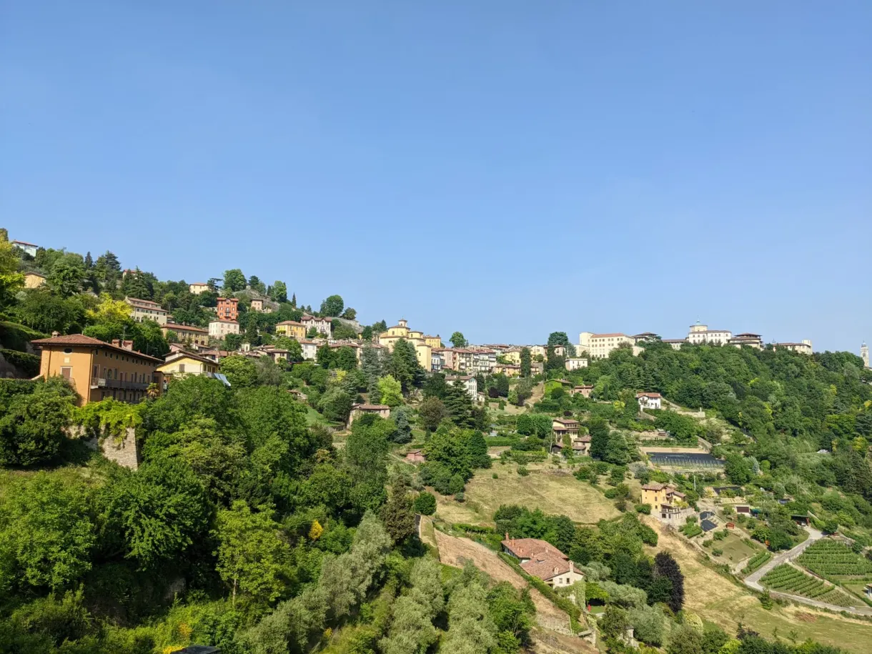 Green valley and village perched on the ridge
