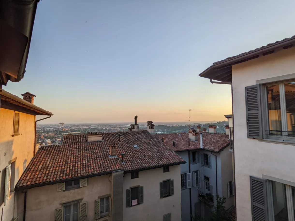Neighbouring facades and roofs in the light of the setting sun