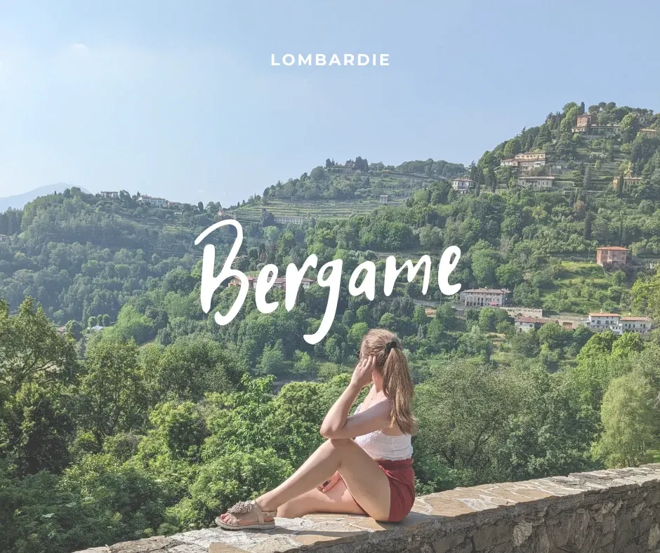 Woman sitting on a low wall facing the hills, Bergamo banner