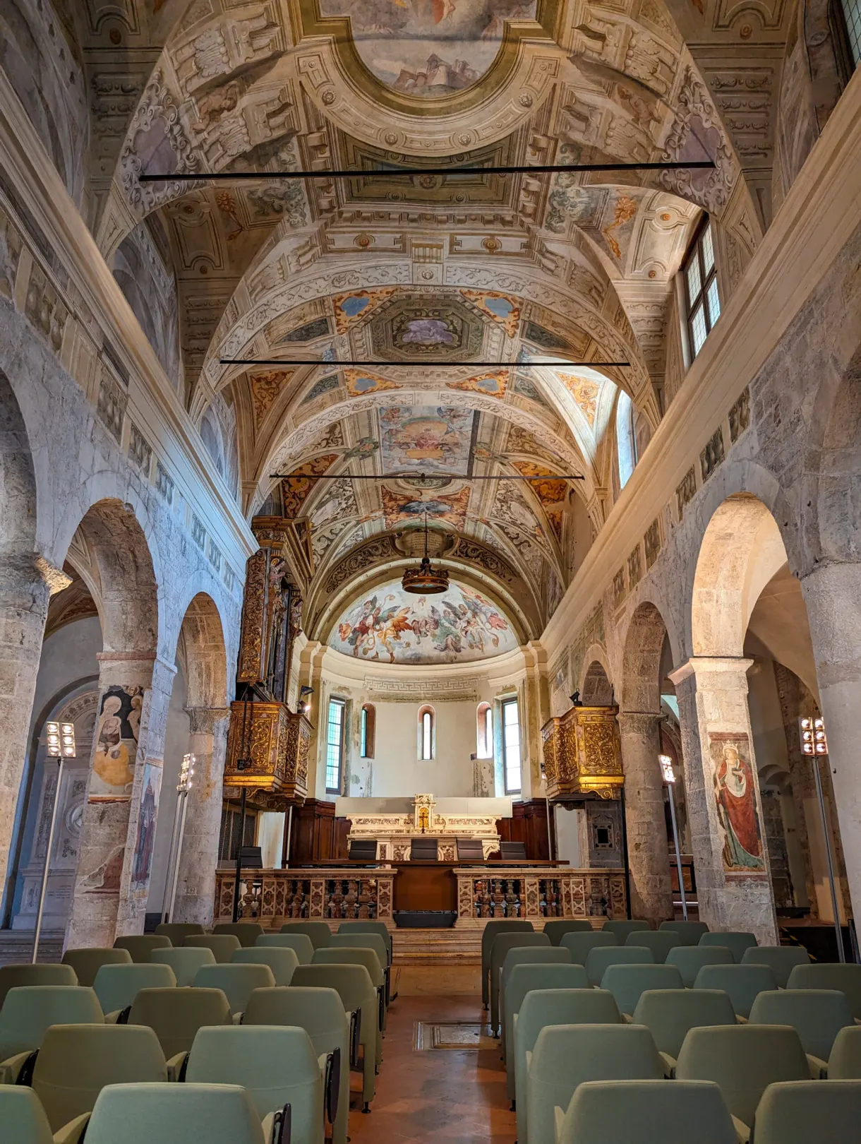 Pale nave and painted vault of a church in Brescia