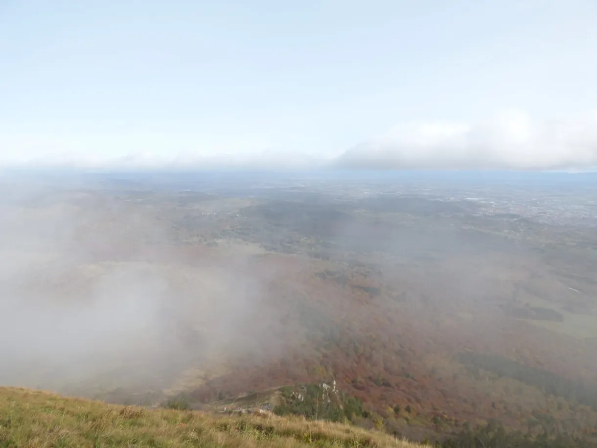 View over the plain from the summit, between two clouds