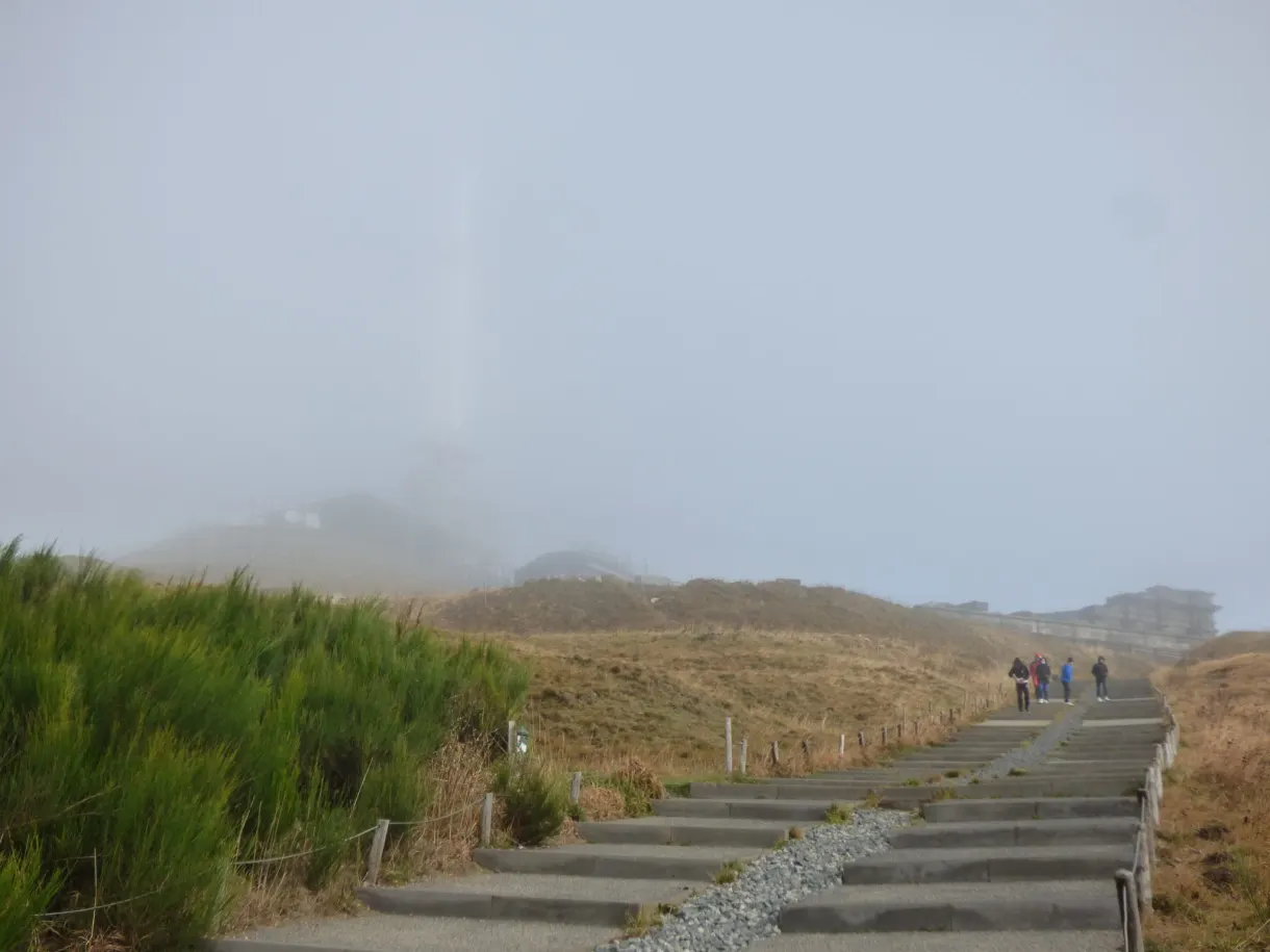 Summit staircase fading into the fog