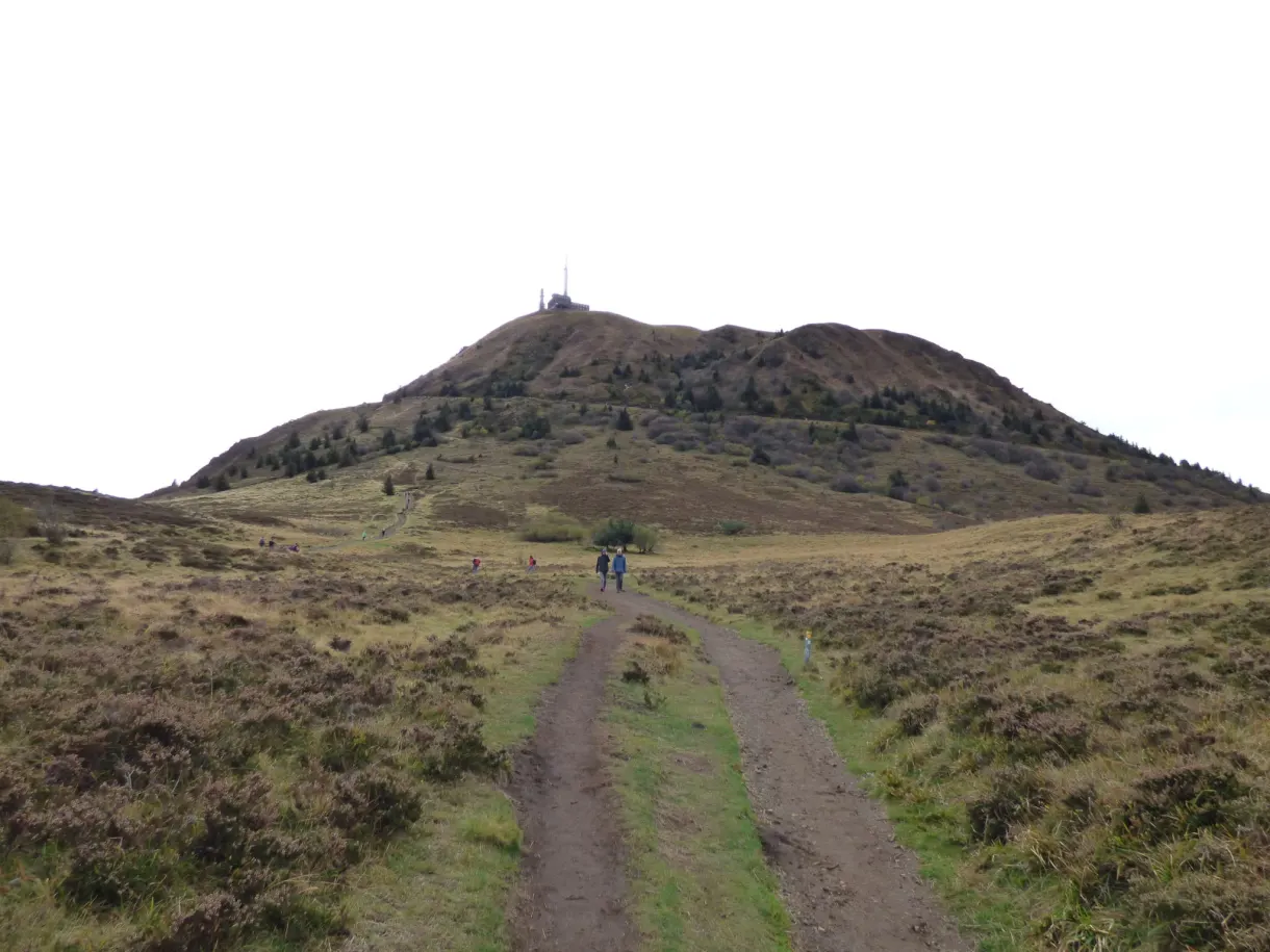 Earth path climbing towards the summit of the volcano