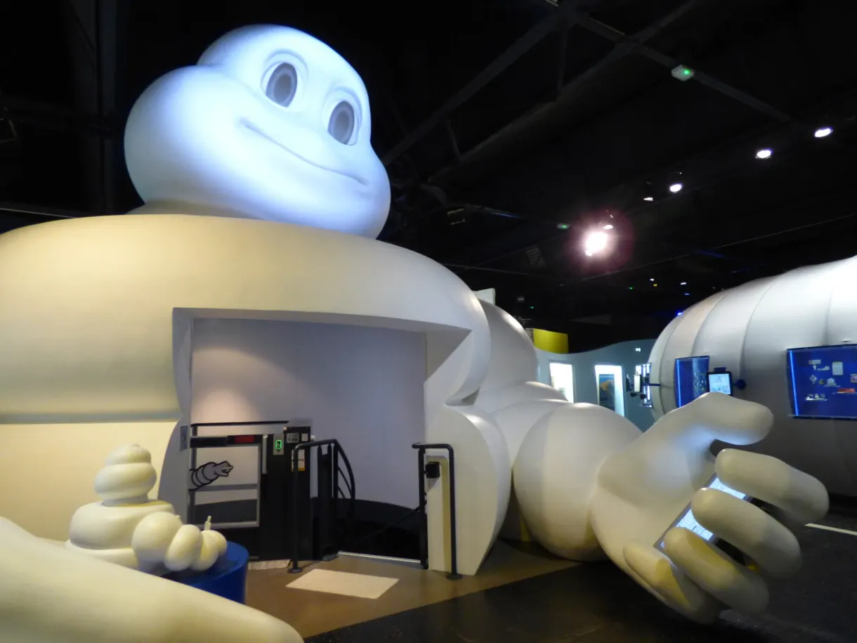 Giant inflatable Bibendum lying in the exhibition room