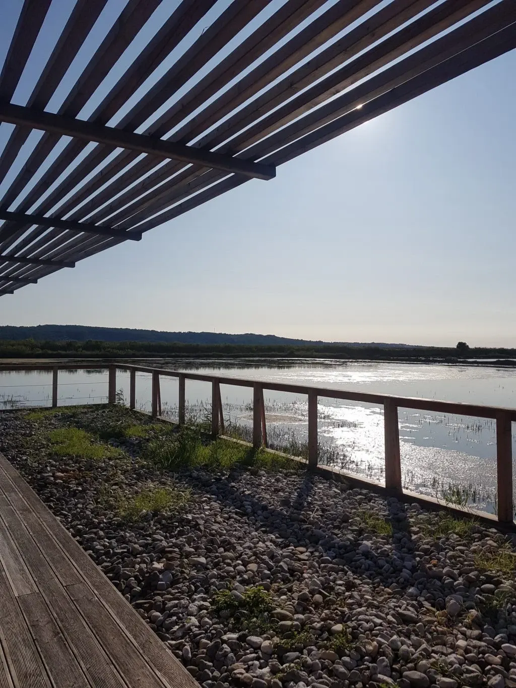 Slatted pergola shading the deck above the salt pans