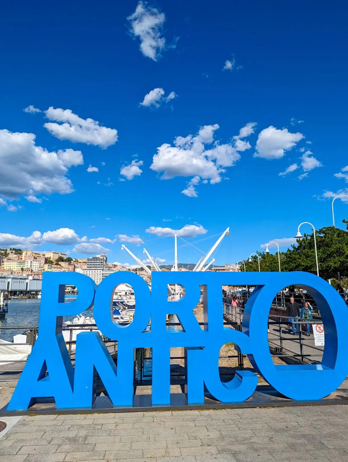 Giant blue Porto Antico letters set on the quay