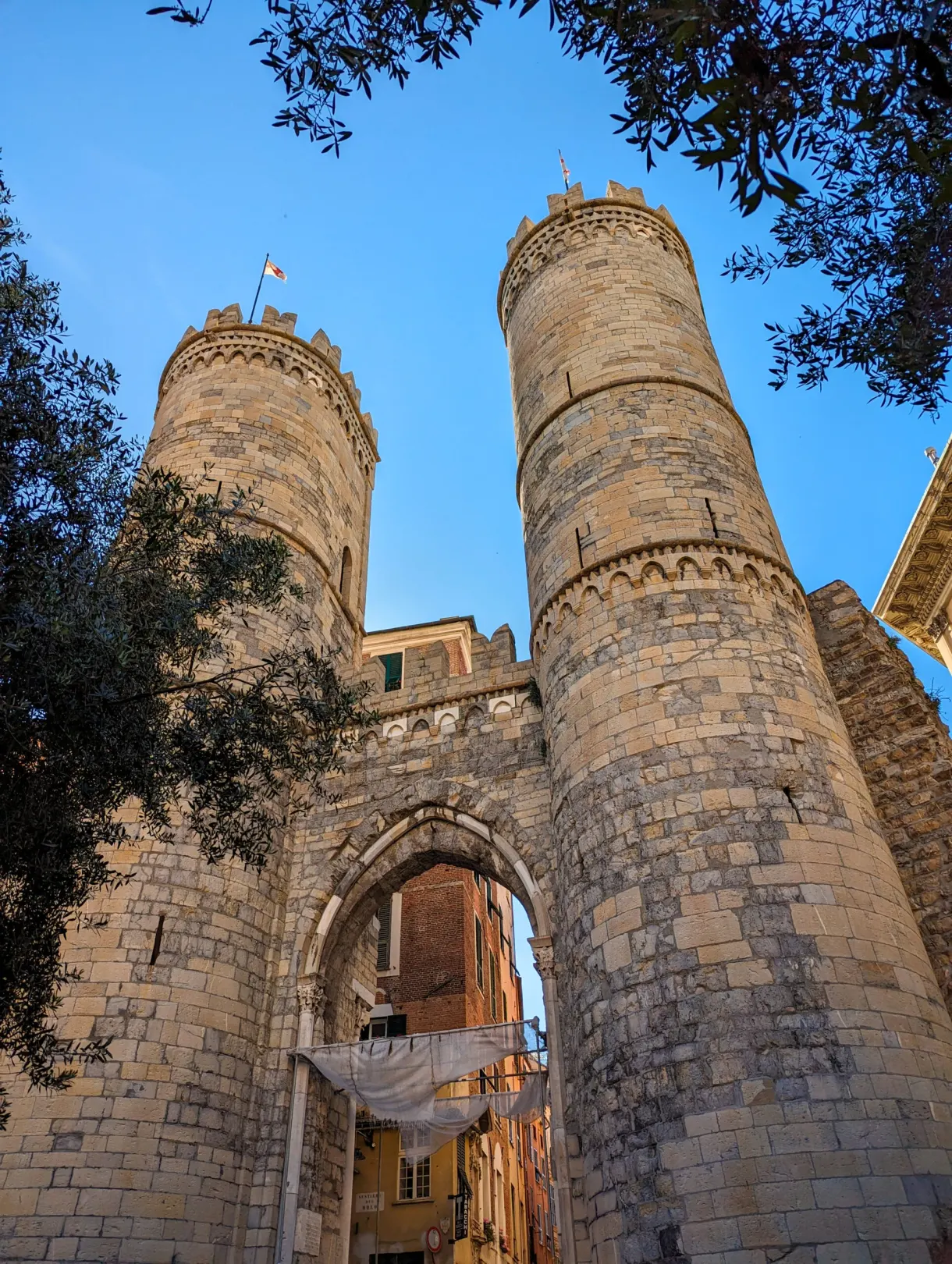 Two medieval towers framing a stone gate