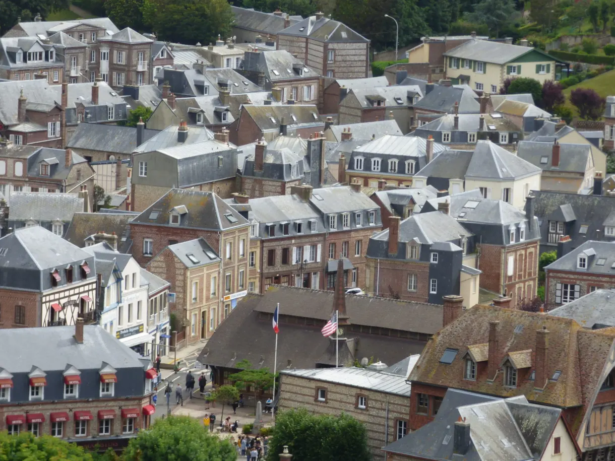 Slate roofs of the town of Étretat seen from the cliff