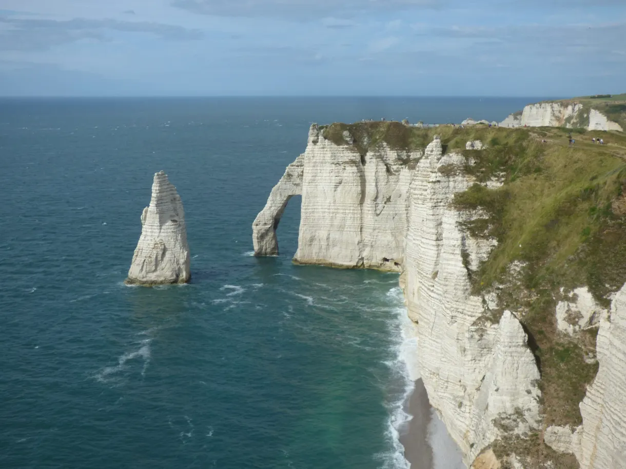 Needle and arch seen from above in a turquoise sea
