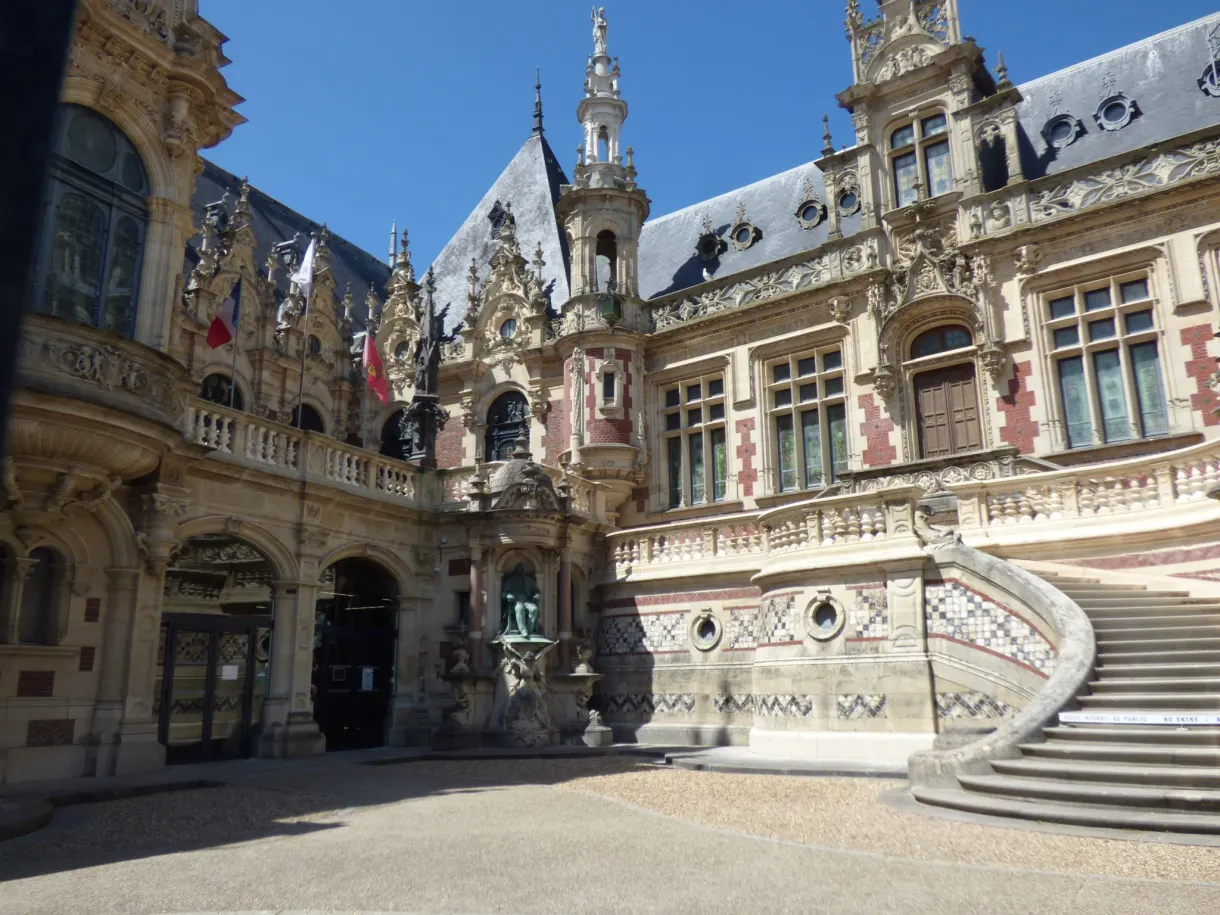 Grand staircase and carved gables of the Bénédictine distillery