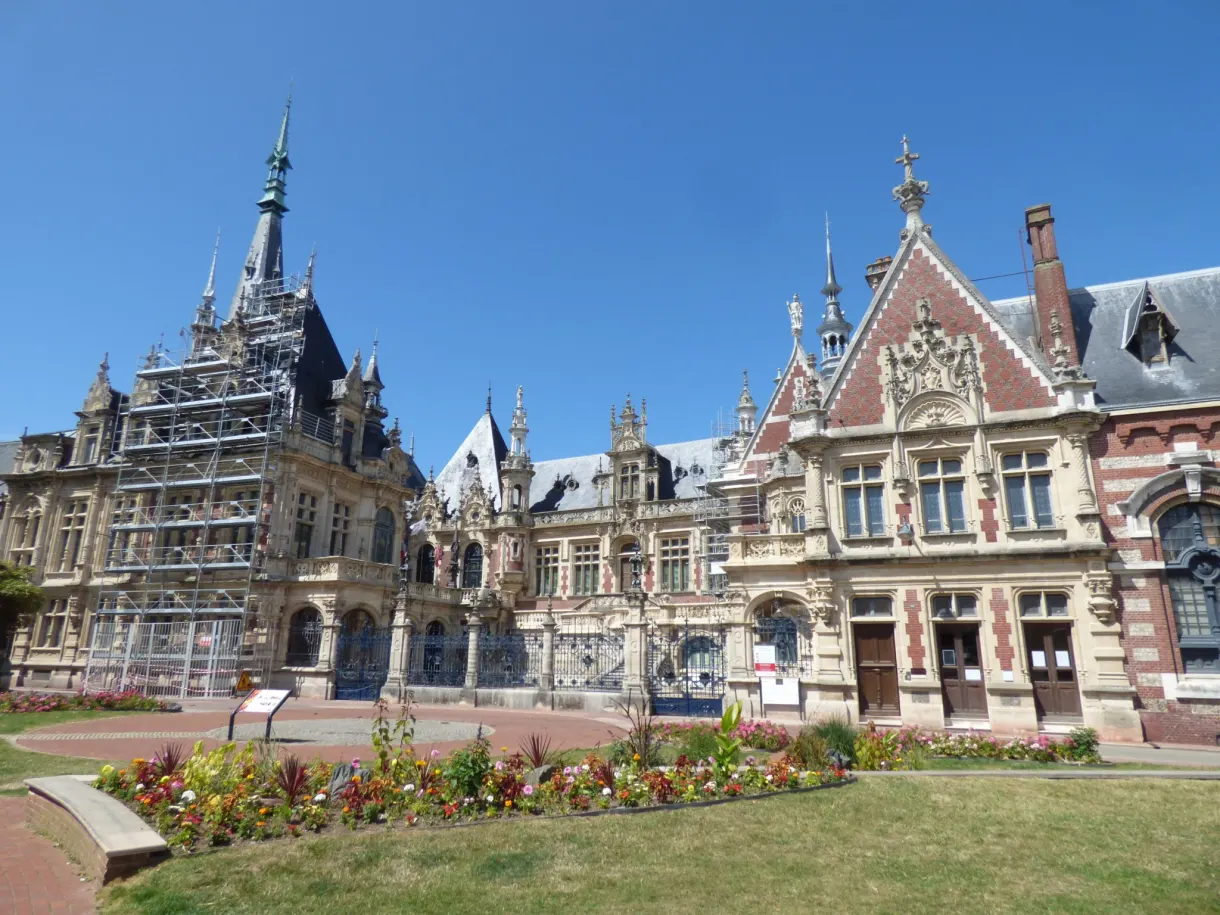 Flower beds in front of the turrets of the Palais Bénédictine