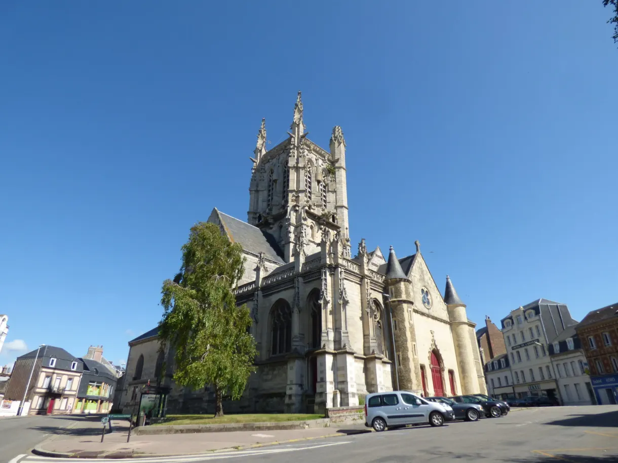 Gothic tower and flying buttresses of the abbey seen from the square
