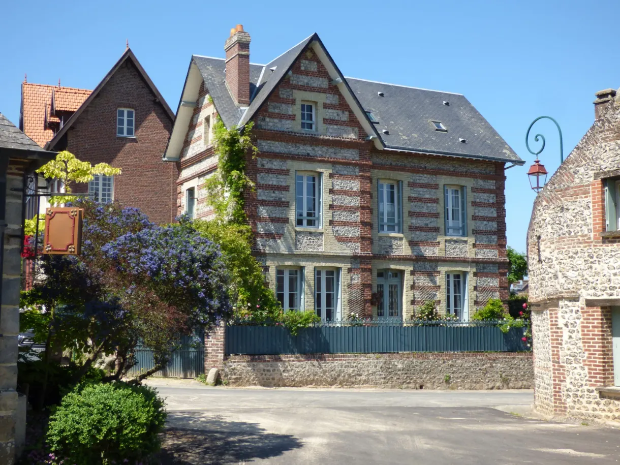 Flower-decked brick and flint house in Veules-les-Roses