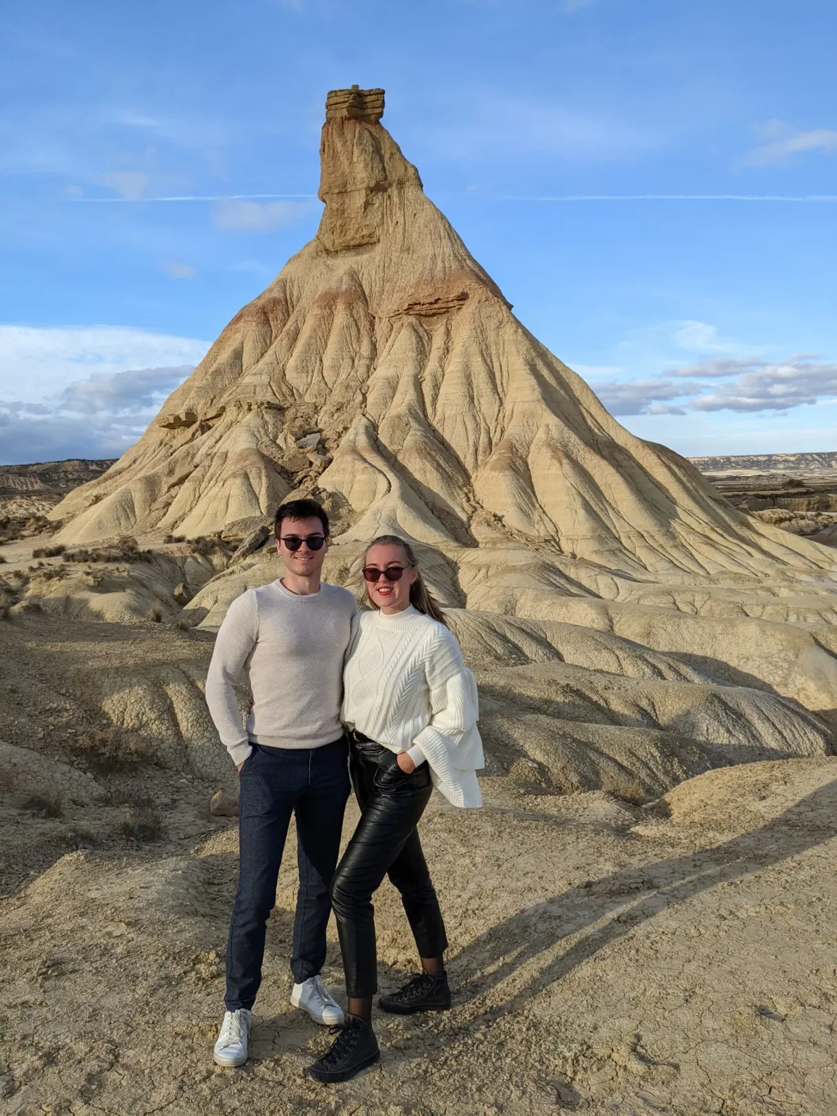 Couple posing at the foot of the hoodoo