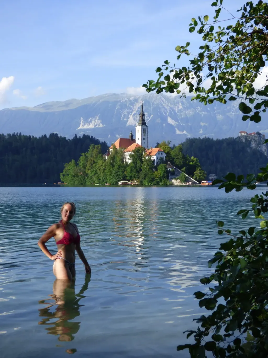 Swimming in the lake, island and bell tower in the background