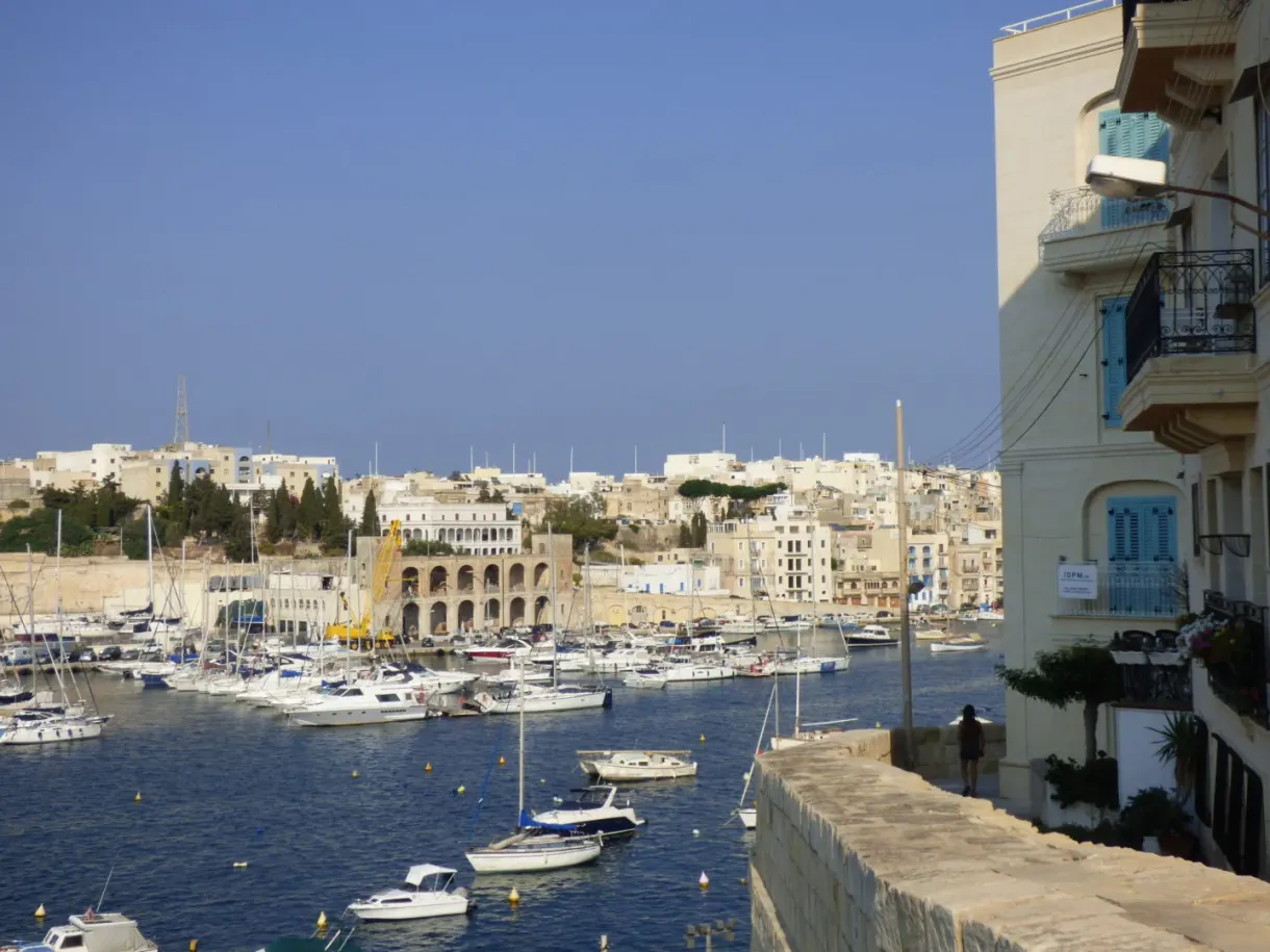 Marina and white facades seen from a balcony