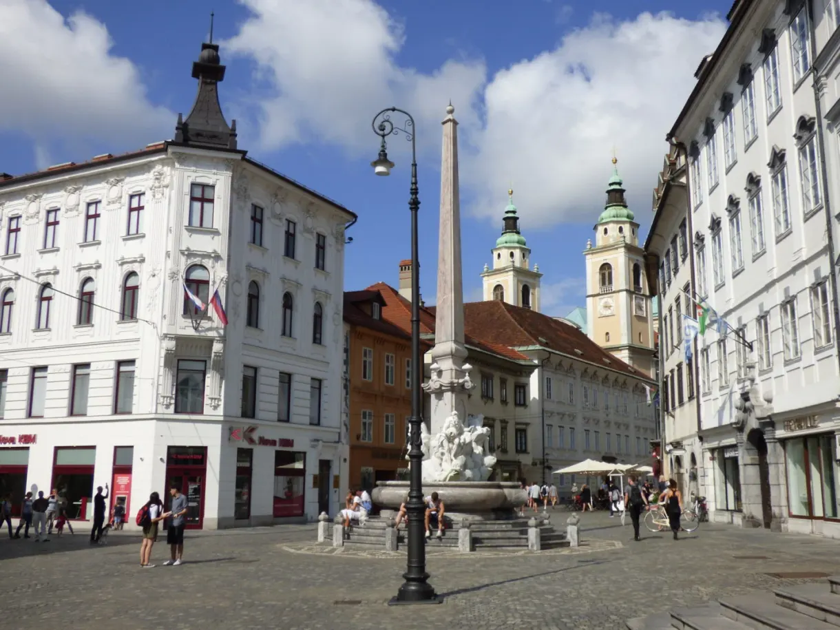 Obelisk and baroque fountain in the middle of the square