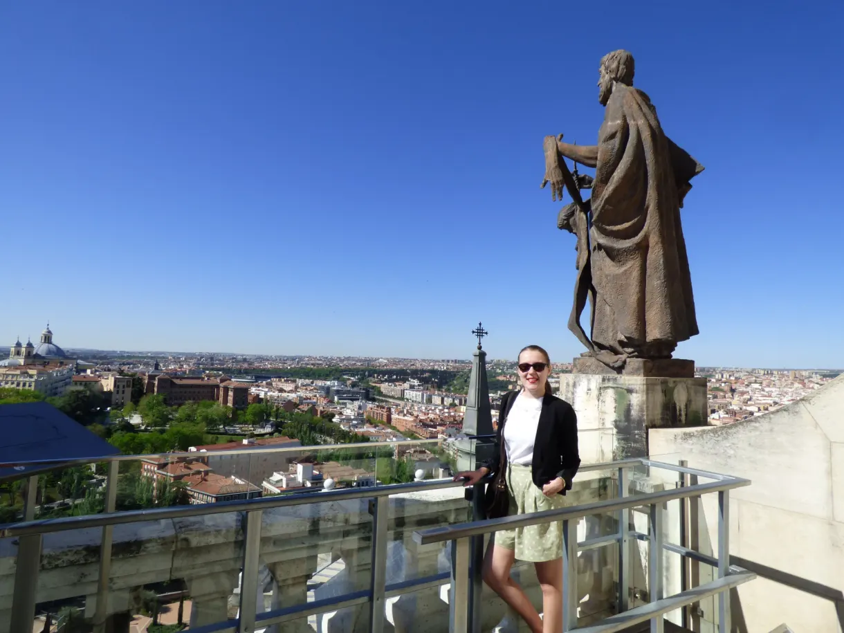 Panoramic walkway at the foot of a stone statue