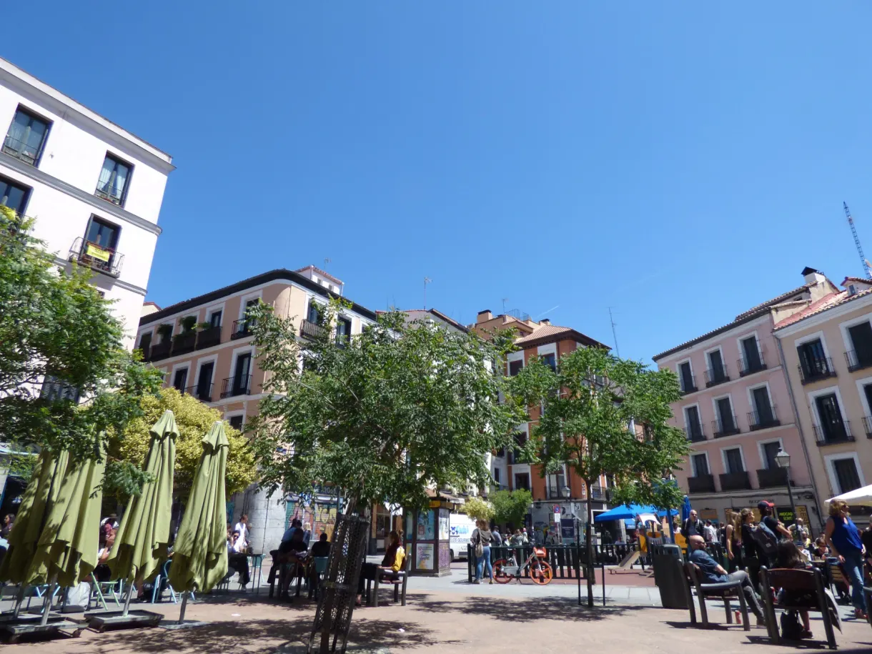 Terraces and folded parasols on a lively square