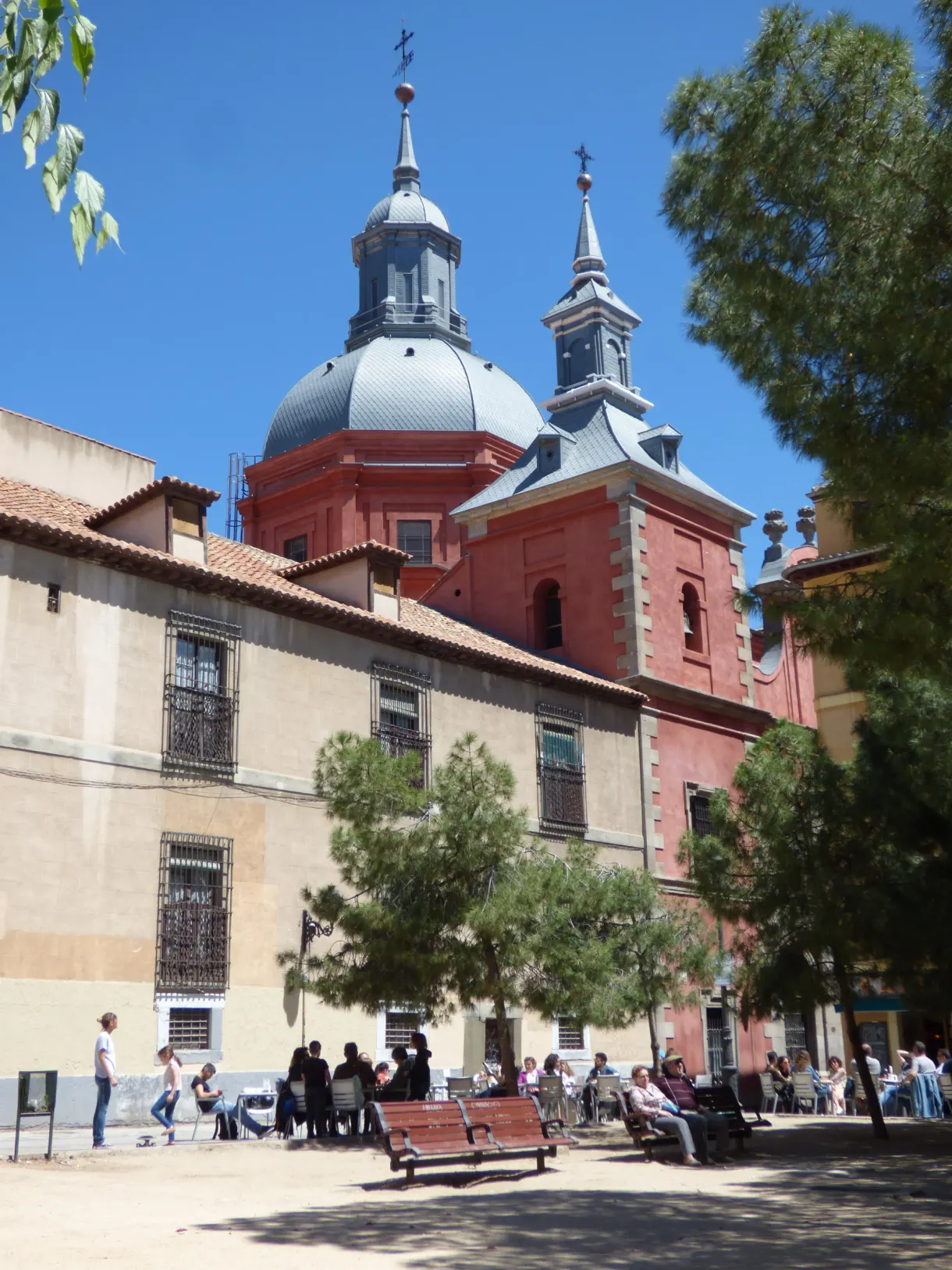 Red brick church and its slate dome on the square