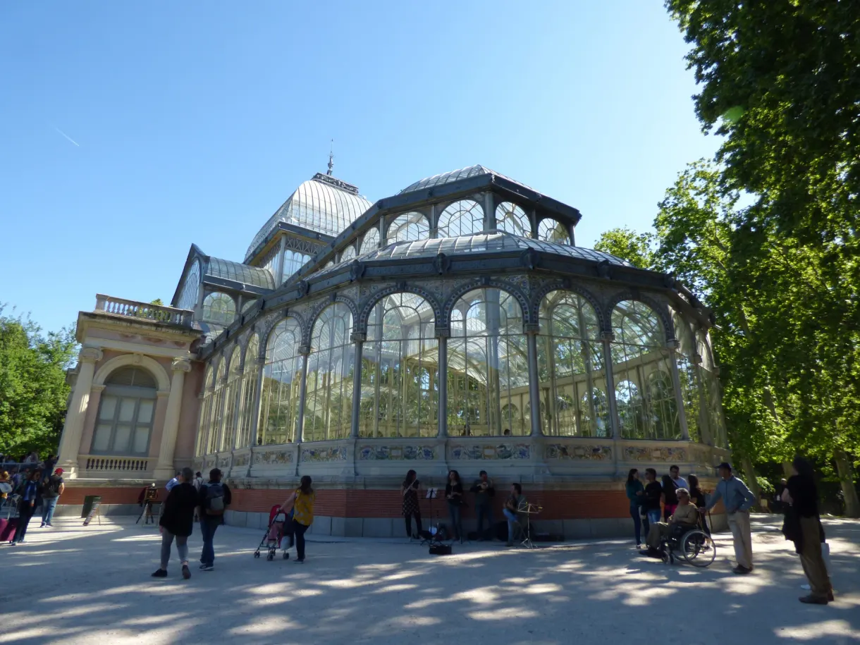 Glass and steel dome at the edge of the park path