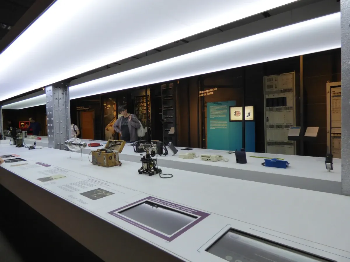 Long lit display cases in a museum room