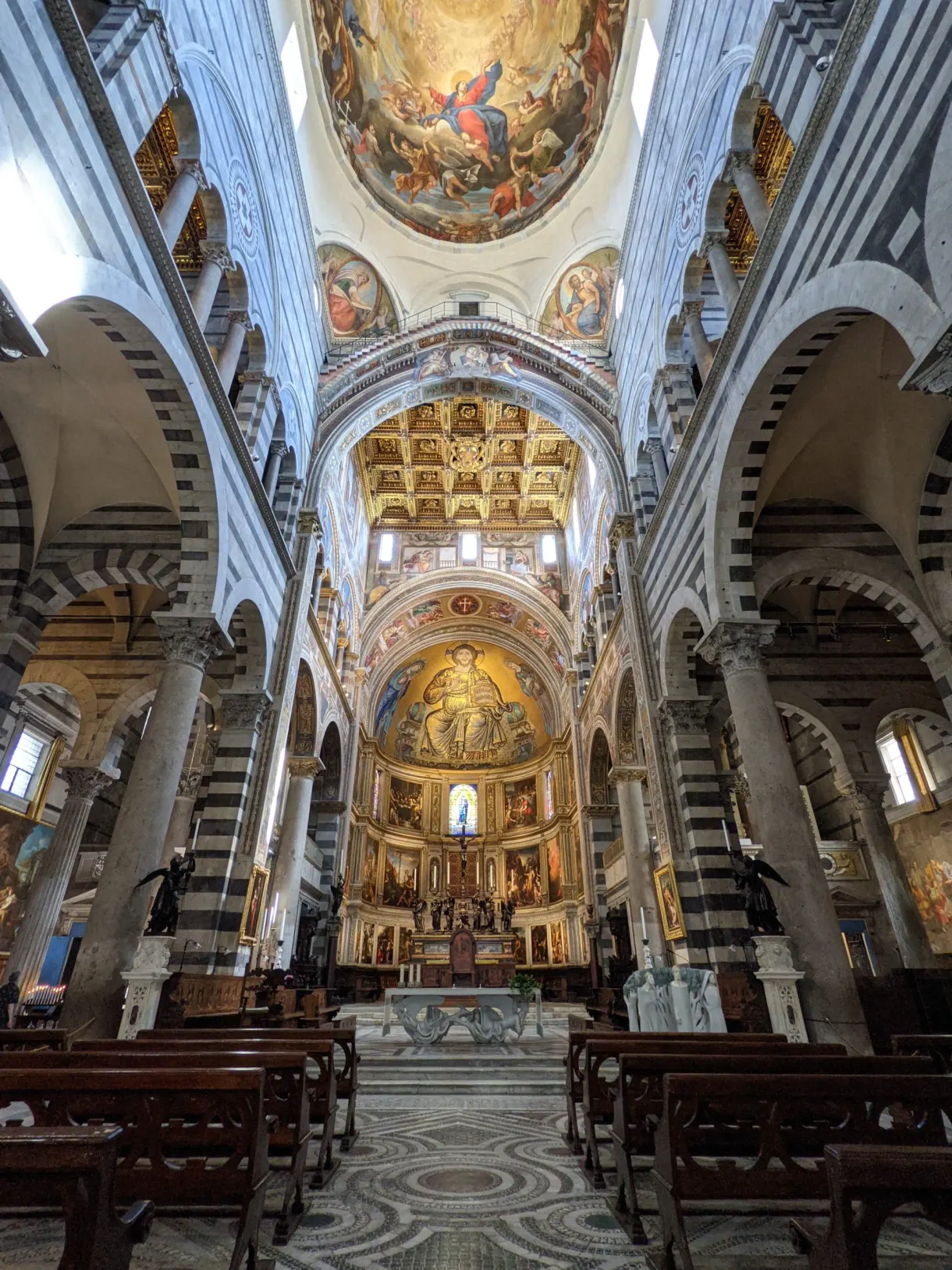 Nave of the cathedral towards the apse and its golden mosaic