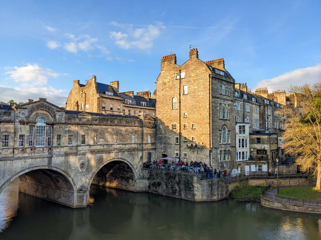 view of Pulteney Bridge in Bath with blue sky