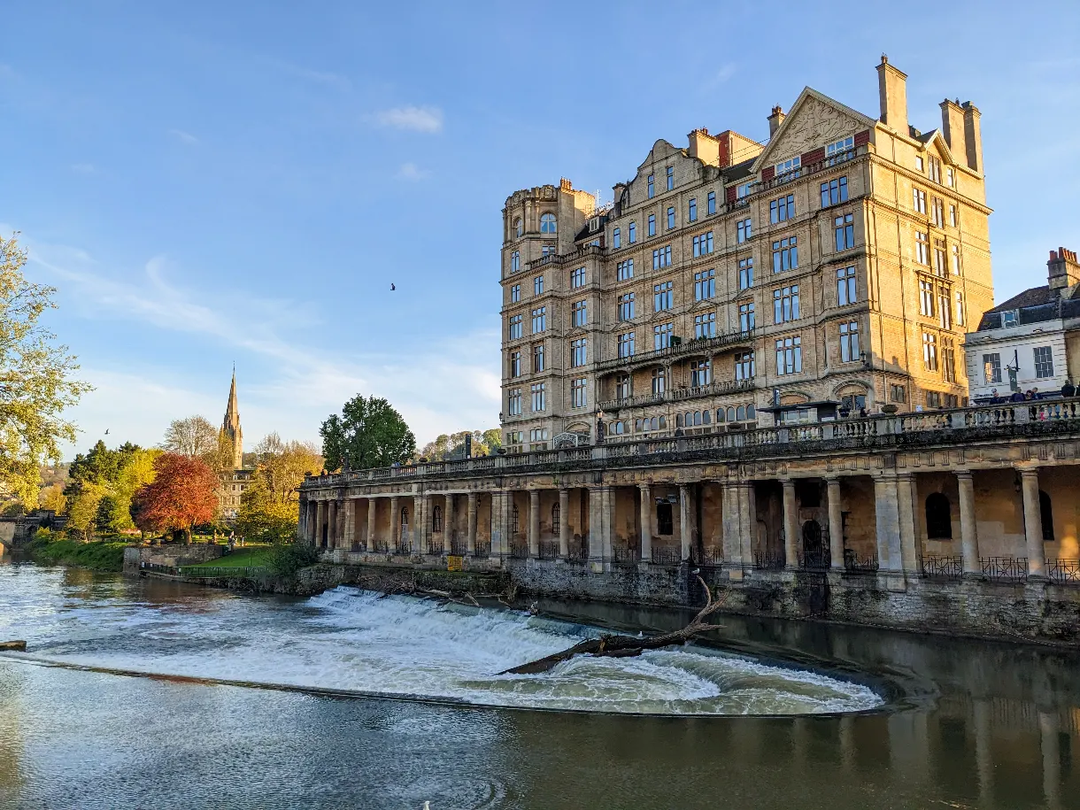 stone building in Bath on the banks of the River Avon