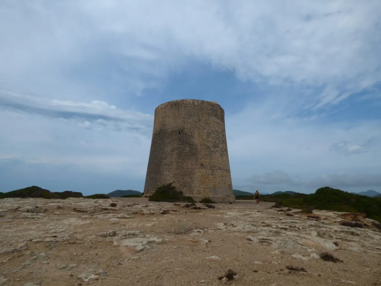 Round stone watchtower standing on the cape