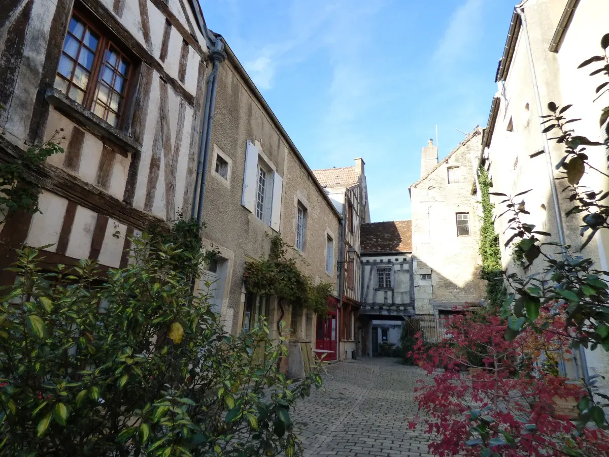 Cobbled lane lined with half-timbered houses