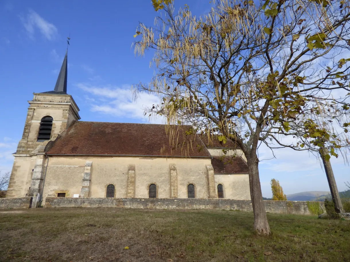 Small Romanesque church standing alone in a meadow