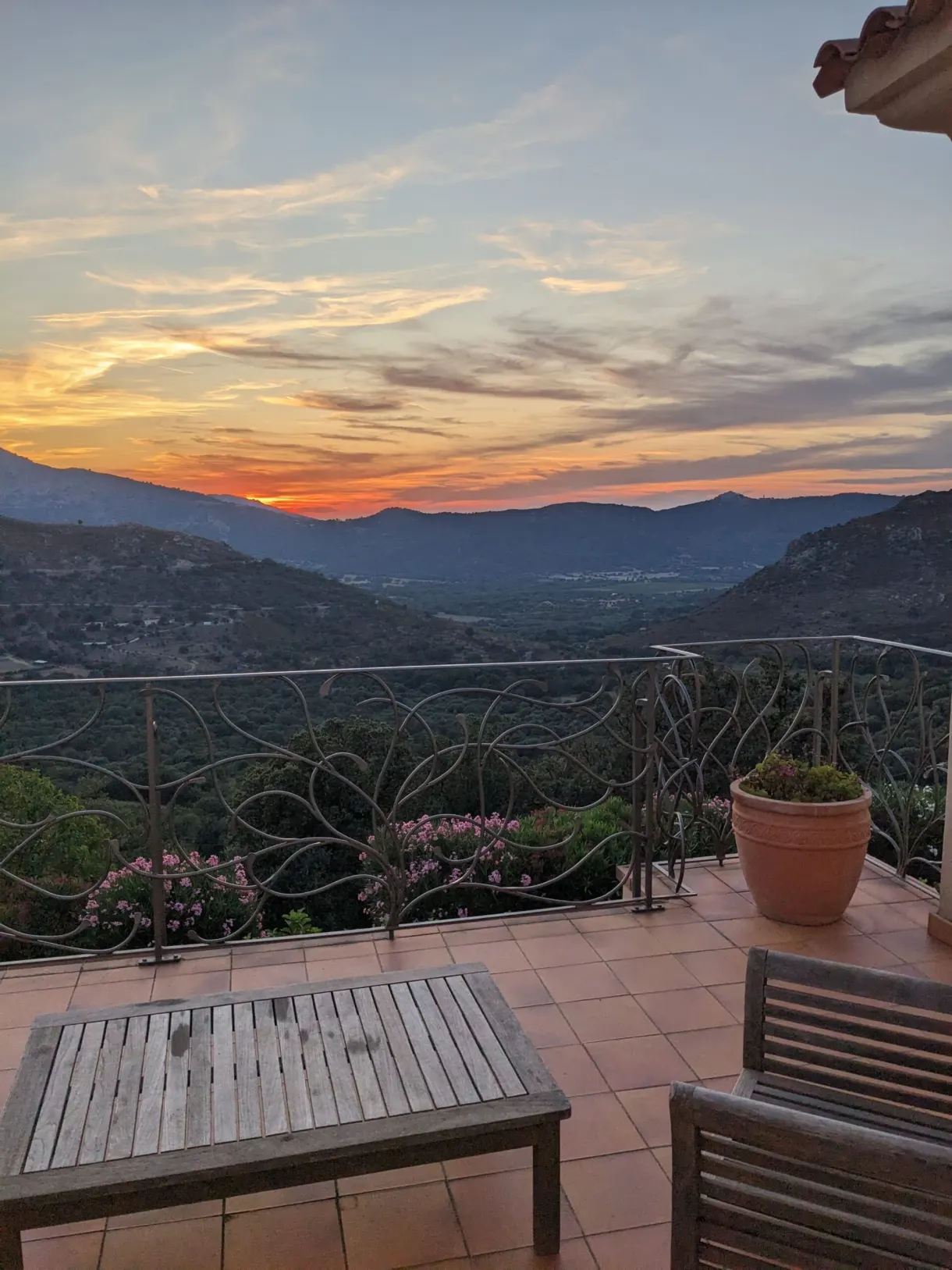 Orange sunset seen from the terrace of the house