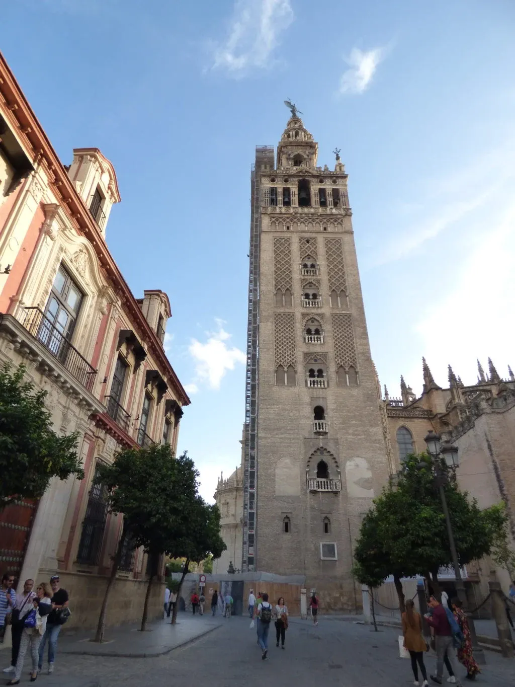 The Giralda at the end of a busy street in the old centre