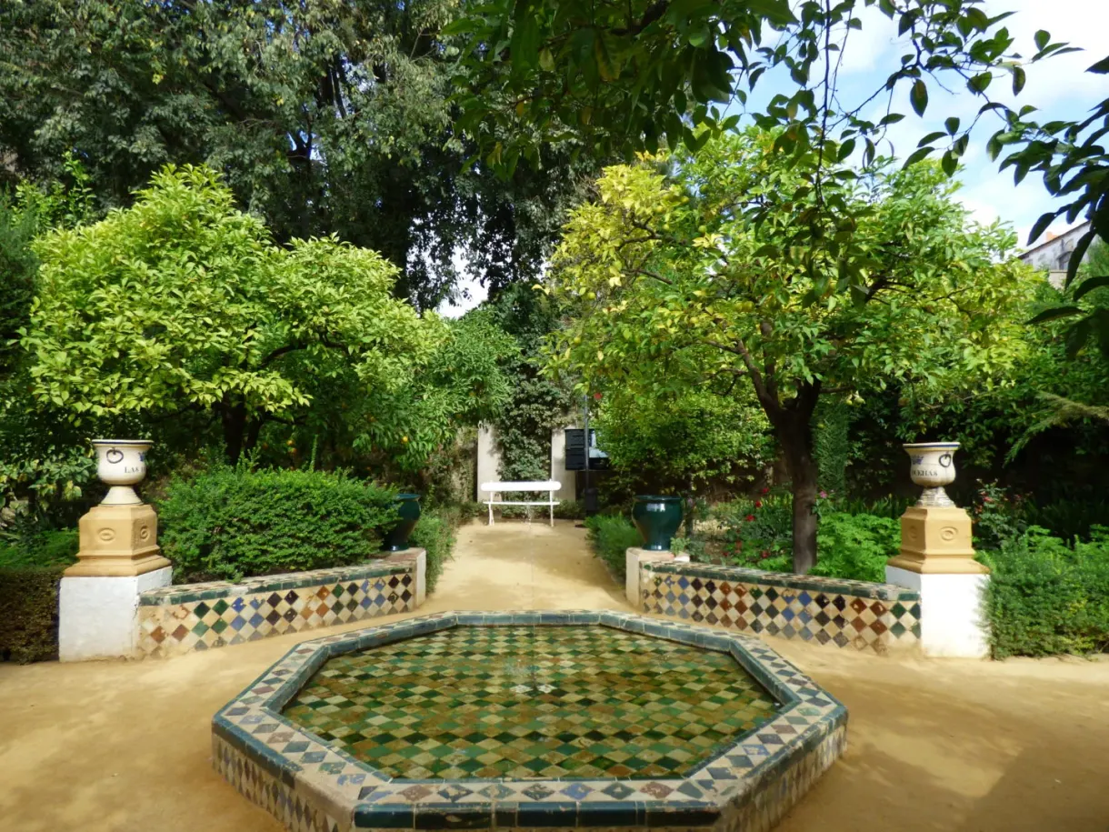 Octagonal green ceramic pool in the middle of the garden
