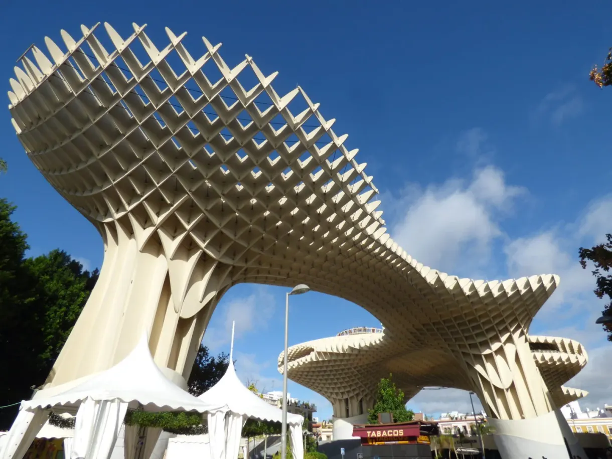 Mushroom-shaped wooden structure against the sky