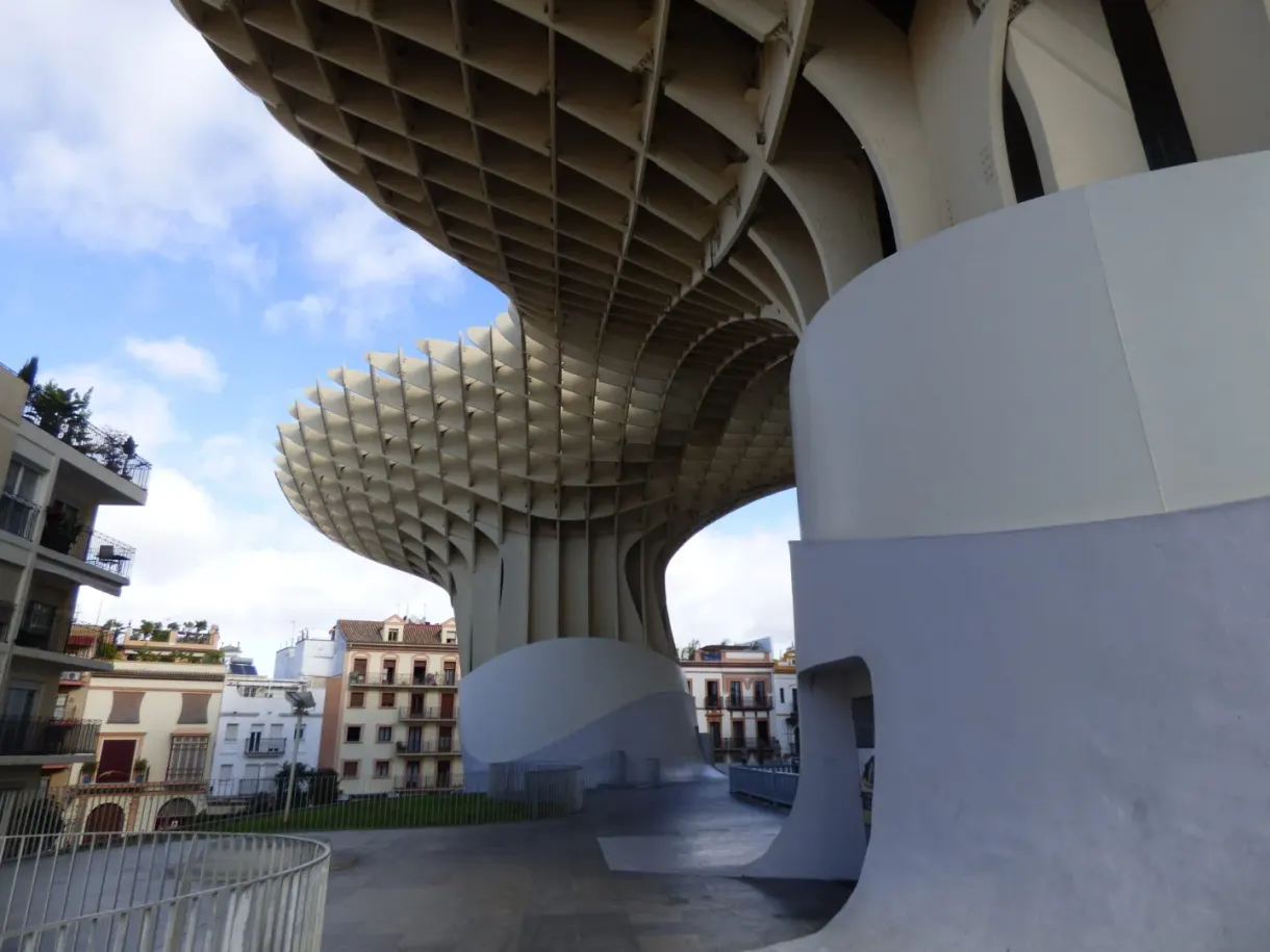 Wooden parasols on pillars above the square