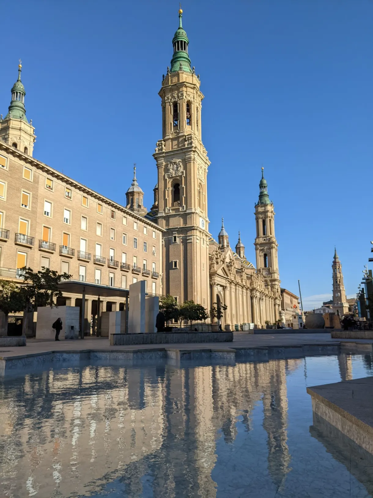 Mirror pool in front of the domes of the Basilica of El Pilar
