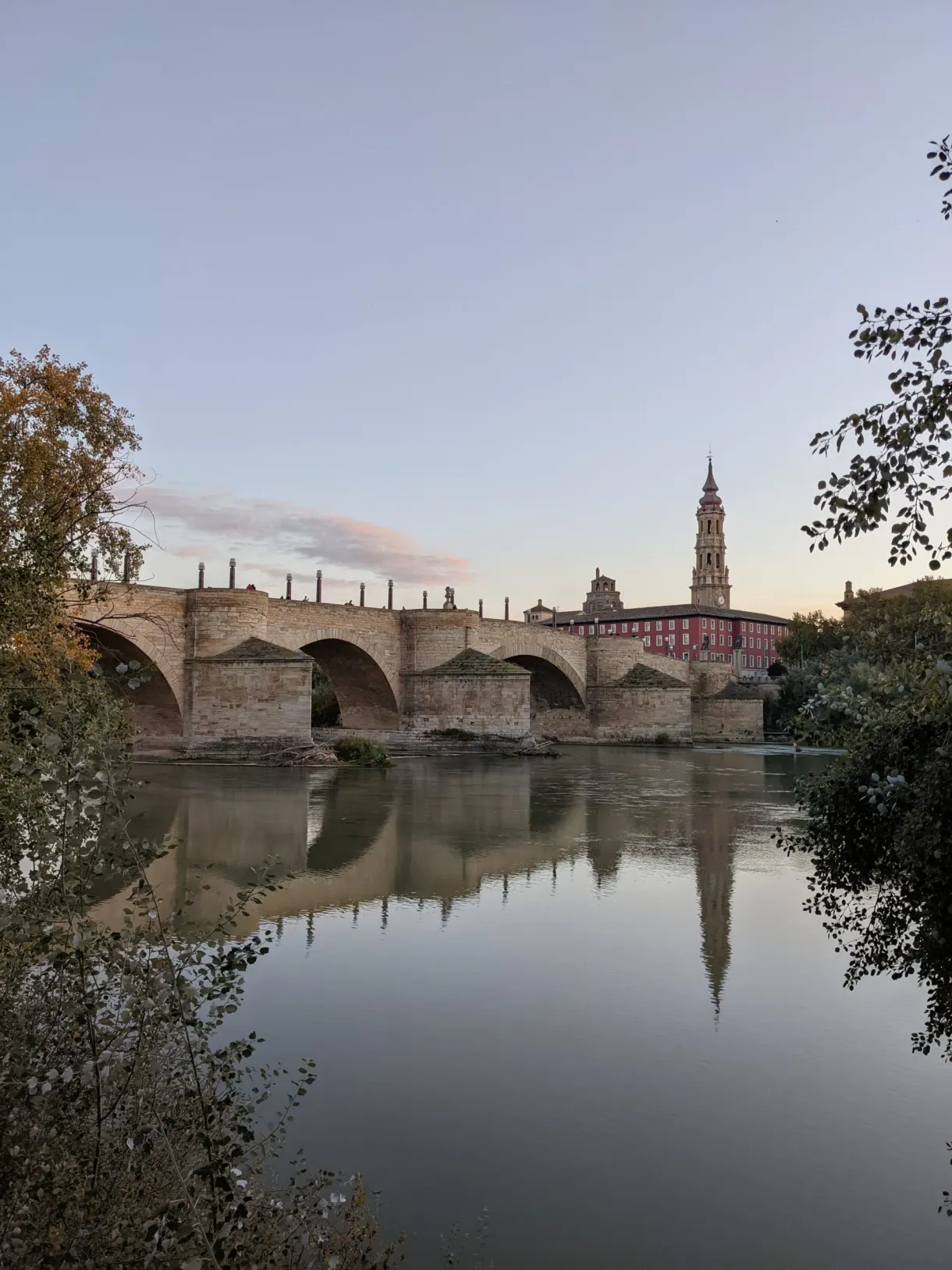 Stone Bridge and its arches reflected at dusk